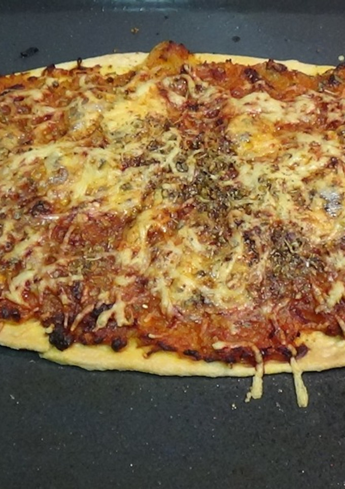 Una foto de Pizza de cebolla y dos quesos