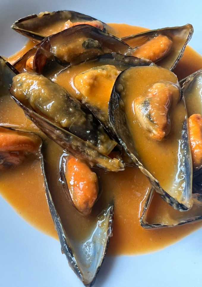 Una foto de Mejillones en salsa