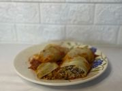Una foto de arros con salsa de carne picada