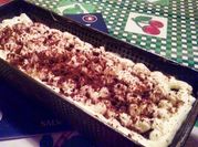 Una foto de chocotorta con crema chantilly