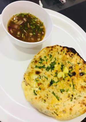 A picture of Paneer, cheese kulcha.