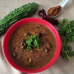 A picture of Hagalkai gojju / Bitter gourd curry.