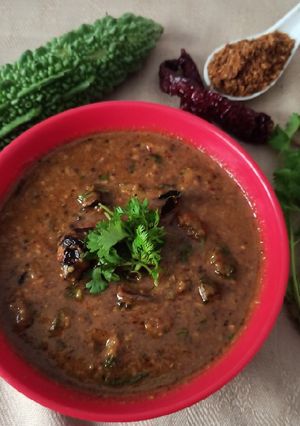 A picture of Hagalkai gojju / Bitter gourd curry.