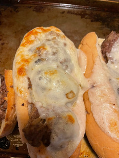 A picture of French Onion meatball subs.