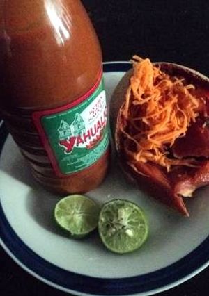 Una foto de Colación de mamey y zanahoria rallada con limón y salsa industrial