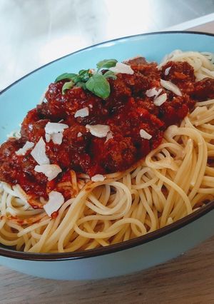A picture of Chipolata and meatball bolognese.