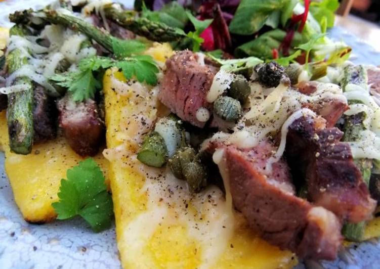 Open steak polenta sandwich with asparagus and horseradish