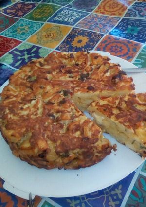 Una foto de Tortilla de papas rellena