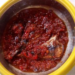 A picture of Fish tomato sauce.