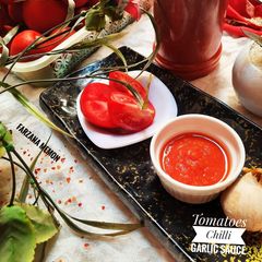 A picture of Tomatoes chilli garlic sauce.