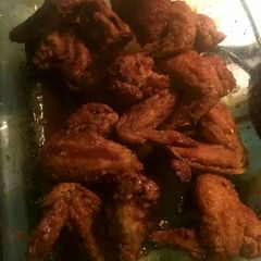 A picture of Dallas BBQ Hennessy Wings.