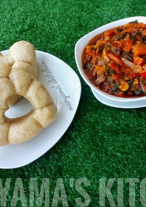 A picture of Alkubus with vegetable soup.