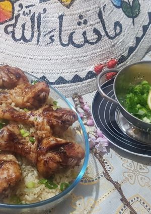 A picture of Rice and meat.