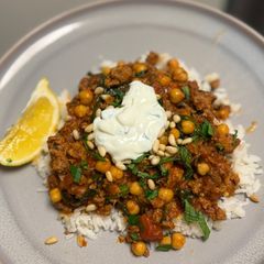 A picture of Moroccan Lamb & Chickpea Stew with Spinach, Yoghurt & Pine Nuts 🥘.