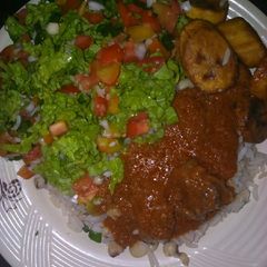 A picture of White rice&beans with stew.