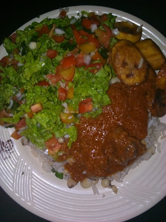 A picture of White rice&beans with stew.