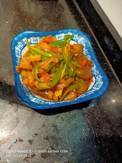A picture of Sauteed spicy beef gravel (oseng kikil sapi) indonesia style.
