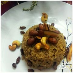 A picture of Dryfruits Rice with Jaggery.