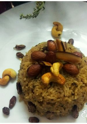 A picture of Dryfruits Rice with Jaggery.