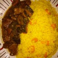 A picture of Tumeric Rice with Assorted Pepper soup.