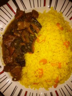 A picture of Tumeric Rice with Assorted Pepper soup.