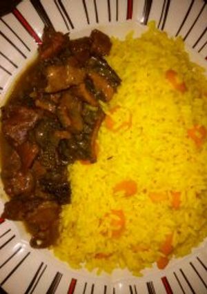 A picture of Tumeric Rice with Assorted Pepper soup.