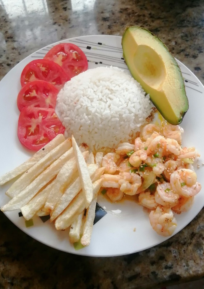 Una foto de Camarones en Mantequilla