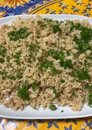 A picture of Brown Rice with Vegetable Broth and Parsley.