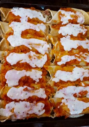 Una foto de Canelones de acelga y pollo