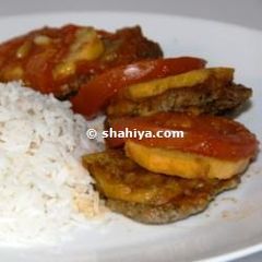 A picture of Baked Kafta with Potatoes.