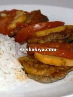A picture of Baked Kafta with Potatoes.