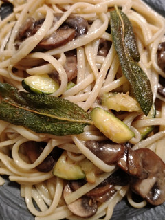 A picture of Mushroom linguine with zucchini and sage.