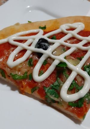 Une photo de Pizza 🍕