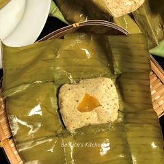 A picture of Steamed Sandesh in Banana Leaf.