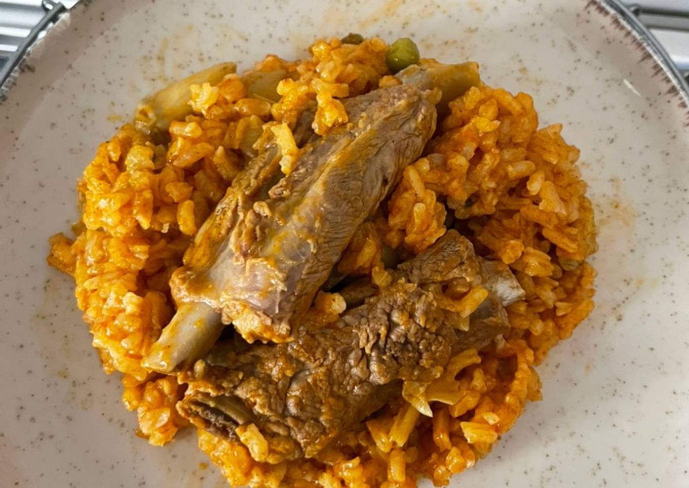 Arroz meloso con costilla y alcachofas