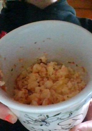 A picture of Scrambled eggs in a cup.