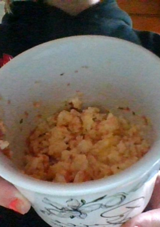 A picture of Scrambled eggs in a cup.