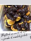 Profitterol con crema al rum e ganache al cioccolato fondente