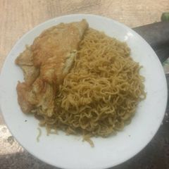 A picture of Buttered Noodles with Fried Egg.