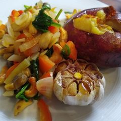 A picture of Baked Sweet Potato, Roasted Garlic & Mixed Vegetables.