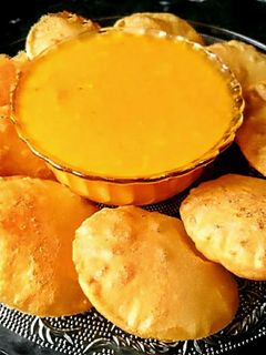 आमरस पुरी (aamras puri recipe in marathi) रेसिपी चे मुख्य फोटो 