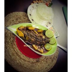 A picture of Tilapia Fish Kalia/Curry.