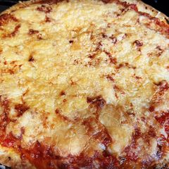 A picture of Chicago-Style Deep Dish Pizza.