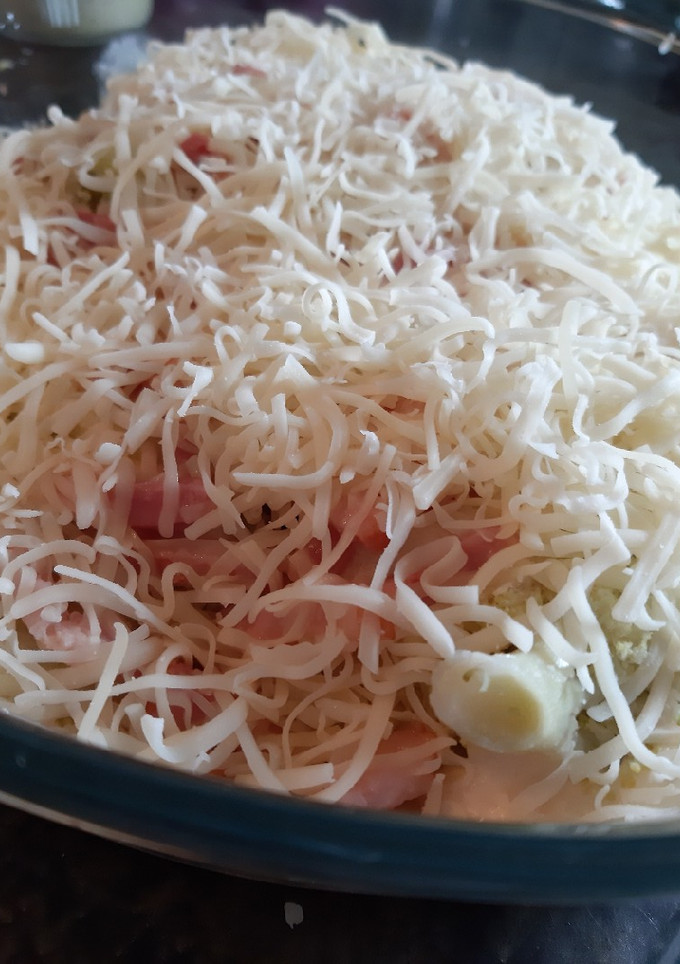 Una foto de Brócoli con bechamel, patata y bacon