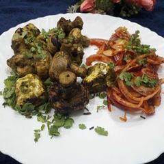 Hariyali paneer mushroom tikka A picture of Hariyali paneer mushroom tikka.