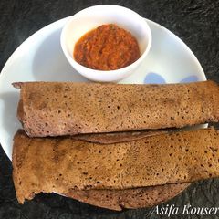 A picture of Ragi dosa With Tomato Chutney.
