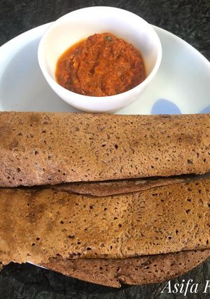 A picture of Ragi dosa With Tomato Chutney.