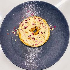 A picture of Dry fruit rabdi ghevar.