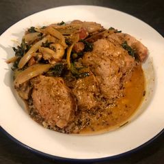 A picture of ‘’Double pork’’ in a shallot mushroom and rosemary sauce.