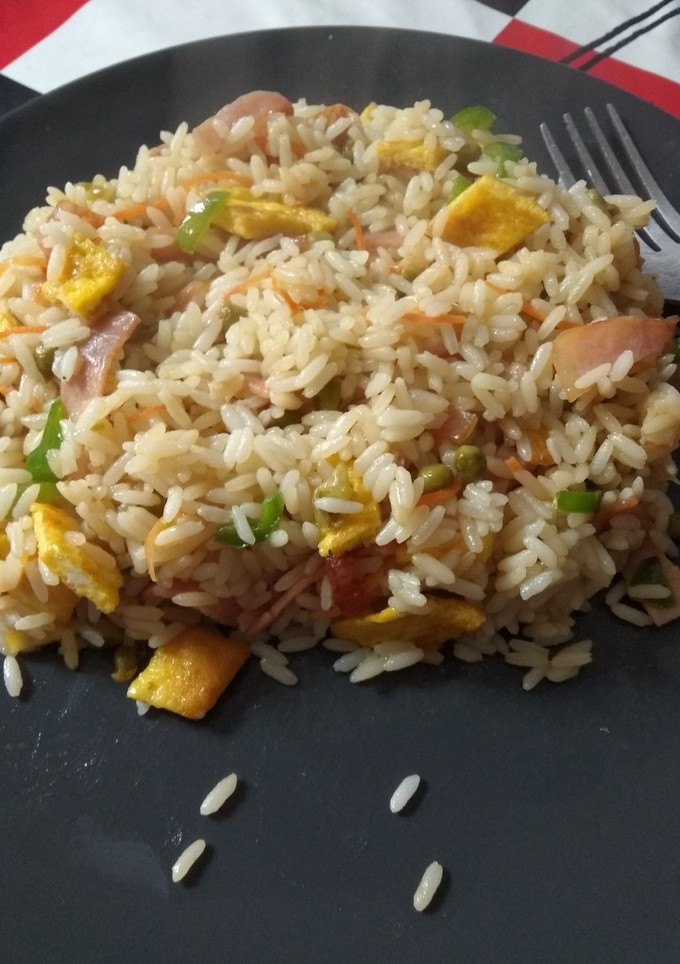 Una foto de 🍚 Arroz tres delicias con bacon